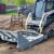 Terex PT75 skid steer loader w/many attachments - Image 1